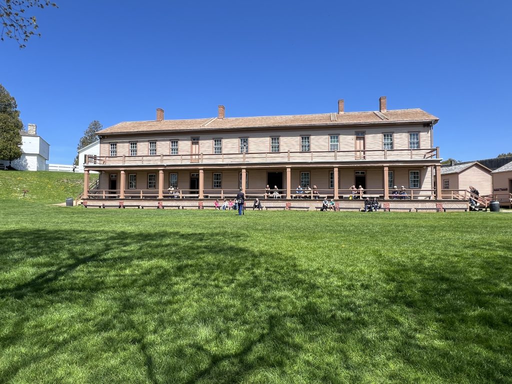 Riffle demonstration out front of the Soldiers' Barracks at Fort Mackinac.